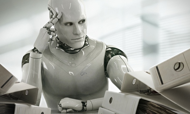 A robot sitting at a desk
